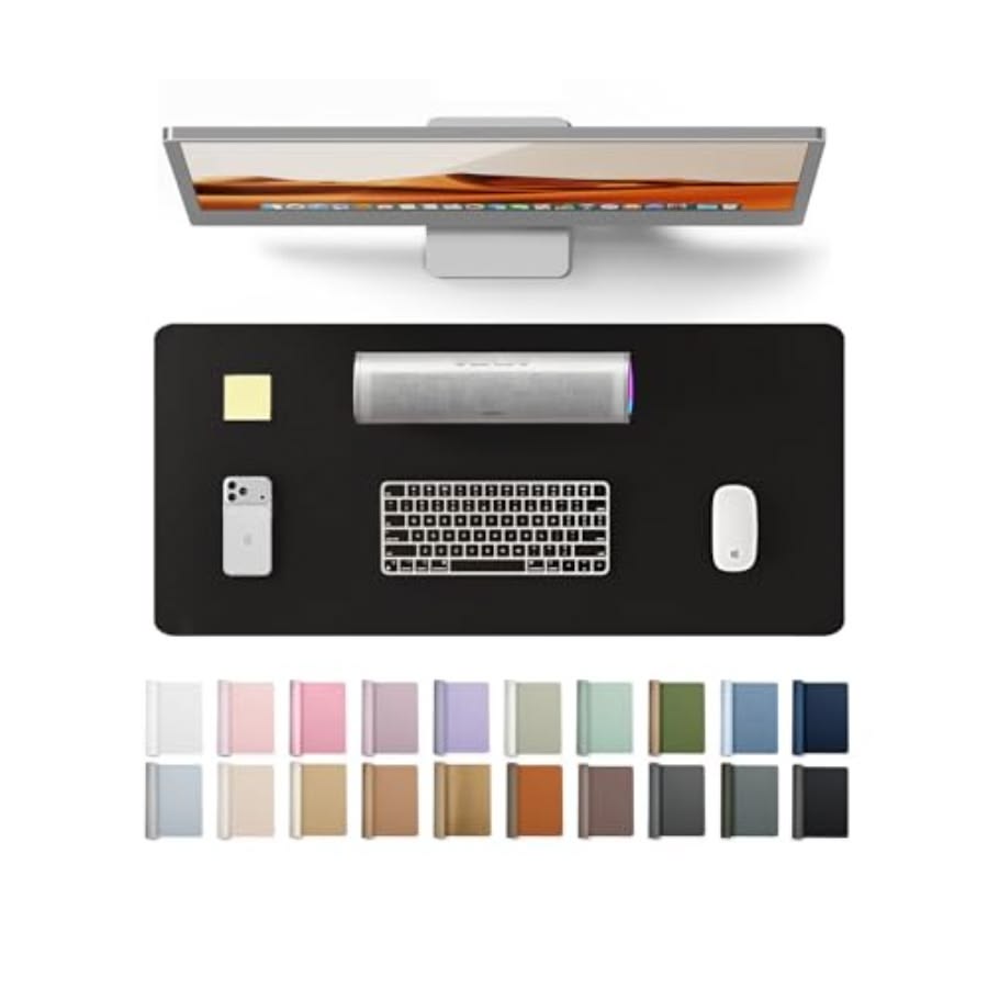 Personalised desk pad in black showing full desk setup with 20 available colour options