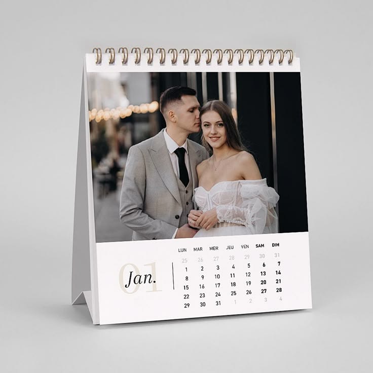 Personalised photo desk calendar 2026 with couple photo and monthly grid spiral bound